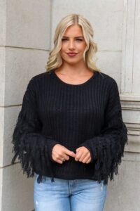 A Woman Wearing a Black Fringe Sleeve Crop Sweater