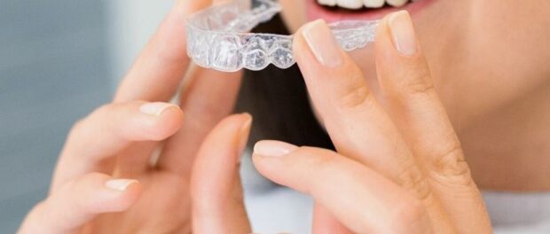 Girl having invisalign braces