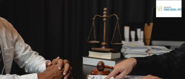 Federal crimes attorney Vikas Bajaj consulting with a client in a law office, discussing legal rights and federal case procedures.